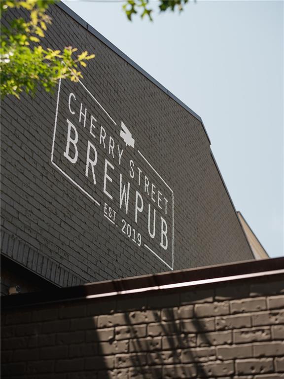 629 Silva Street, Unit 128 Cumming, GA 30040 - Photo 53 of 54 a close up of a street sign