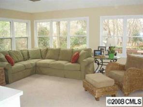 2823 Goneaway Road Charlotte, NC 28210 - Photo 2 of 4 a living room with furniture and a large window