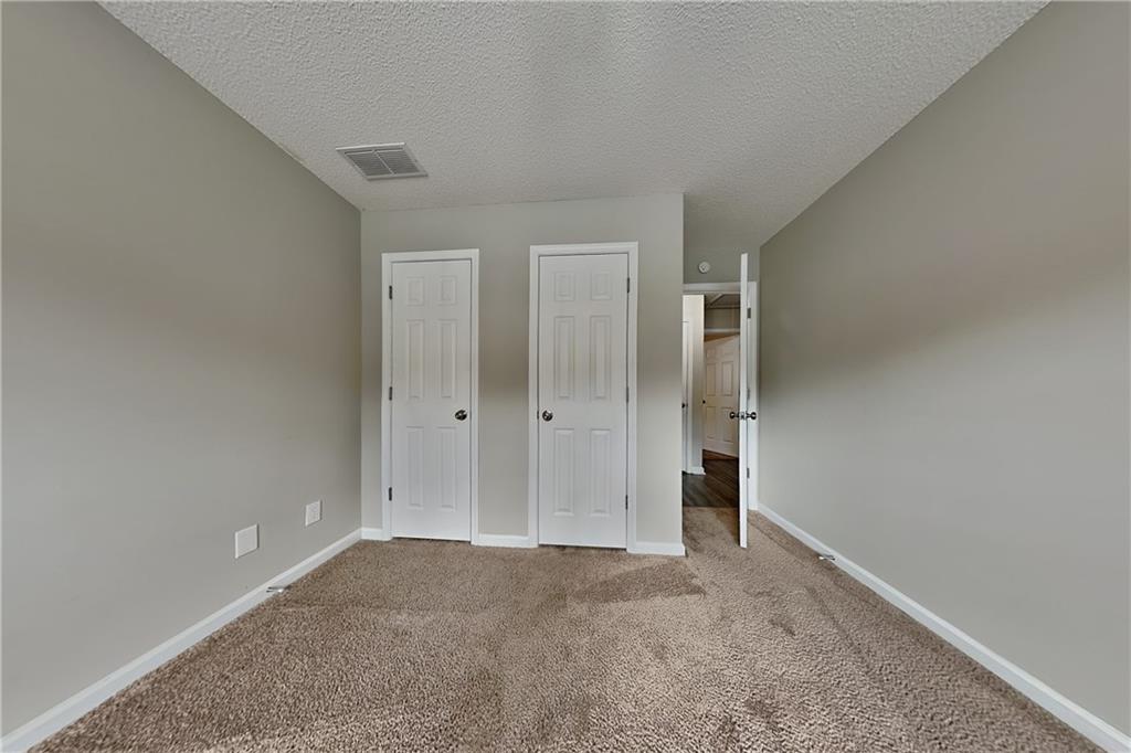 3762 Plymouth Rock Drive Loganville, GA 30052 - Photo 16 of 28 a view of an empty room