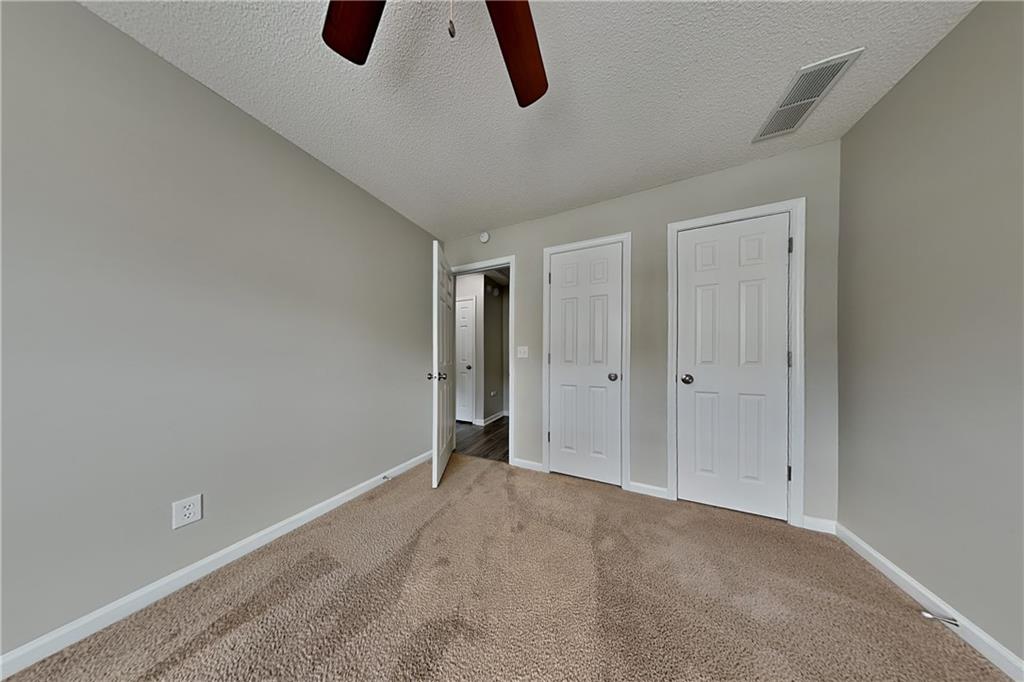 3762 Plymouth Rock Drive Loganville, GA 30052 - Photo 18 of 28 a view of an empty room