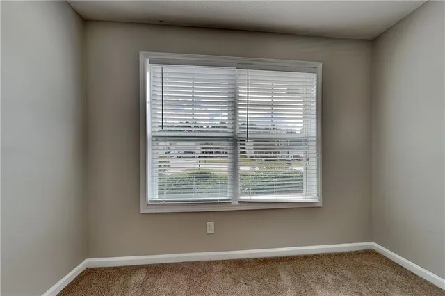 a view of a window in an empty room