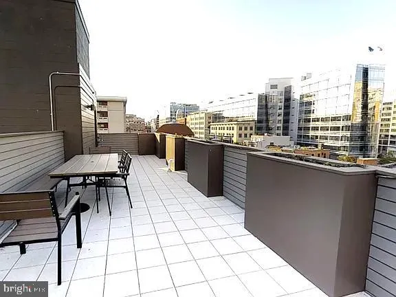 a terrace with a city view