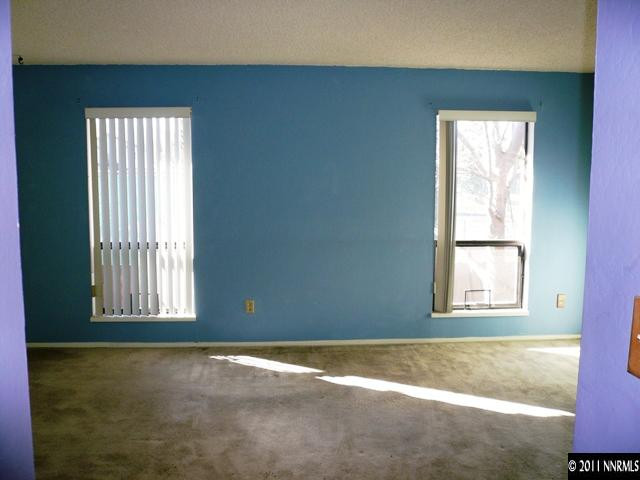 4235 Baker Lane Reno, NV 89509 - Photo 4 of 10 an empty room with windows