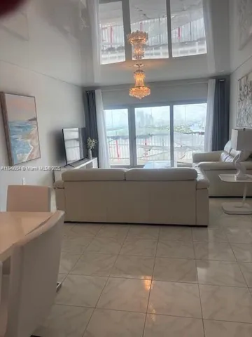 a living room with a couch and a table