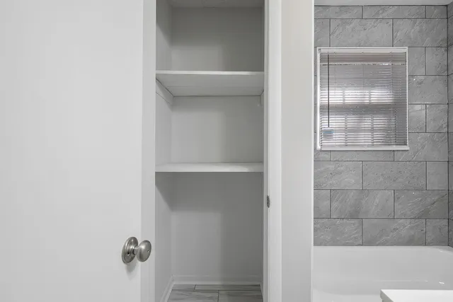 a bathroom with a bathtub