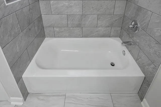 a bathroom with a bathtub