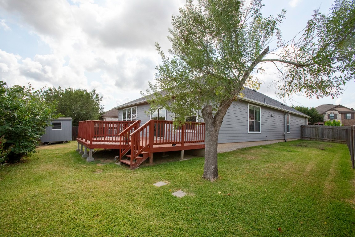 345 Apricot Drive Kyle, TX 78640 - Photo 28 of 37 a view of a house with a yard and sitting area
