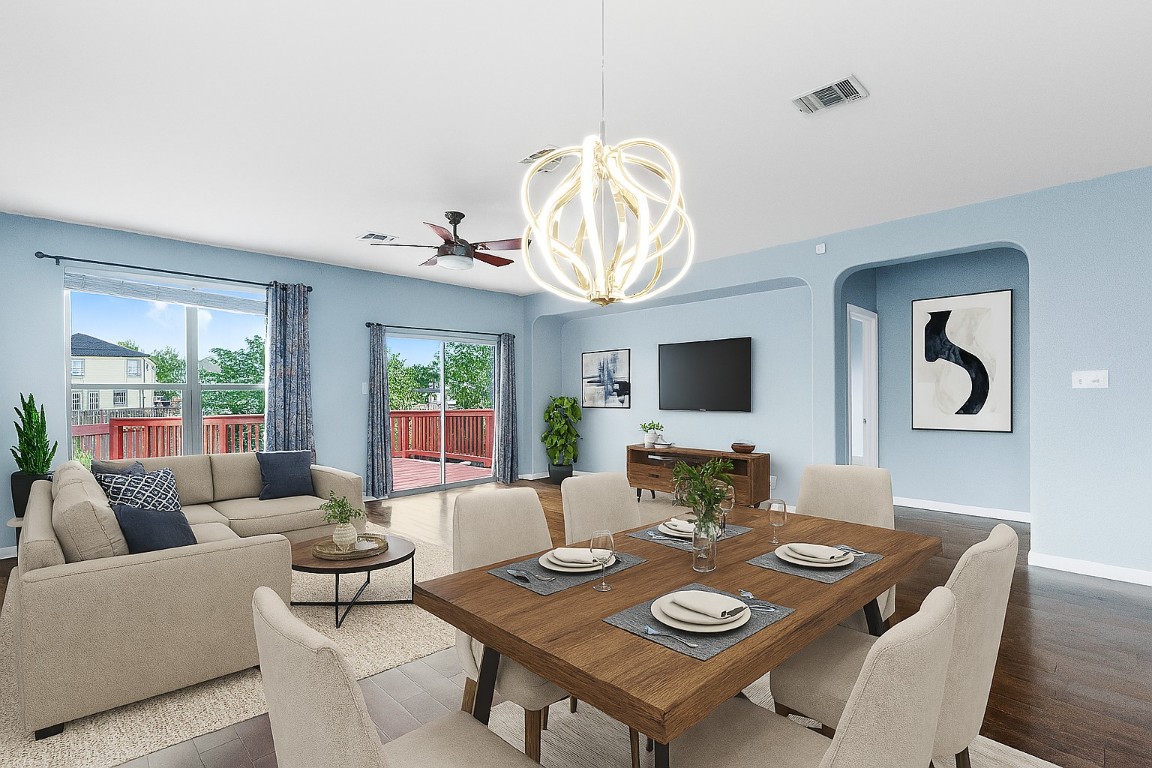 345 Apricot Drive Kyle, TX 78640 - Photo 8 of 37 a living room with furniture kitchen view and a large window