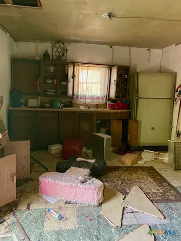 a room with furniture and window