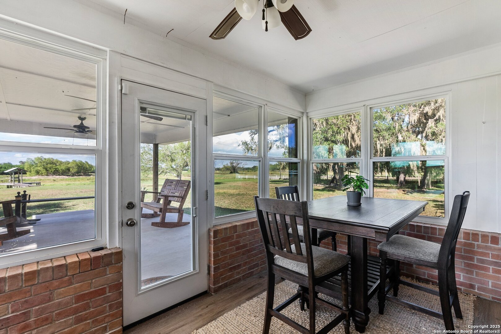 180 Freeman Circle George West, TX 78022 - Photo 27 of 41 a view of a dining room with furniture window and outside view