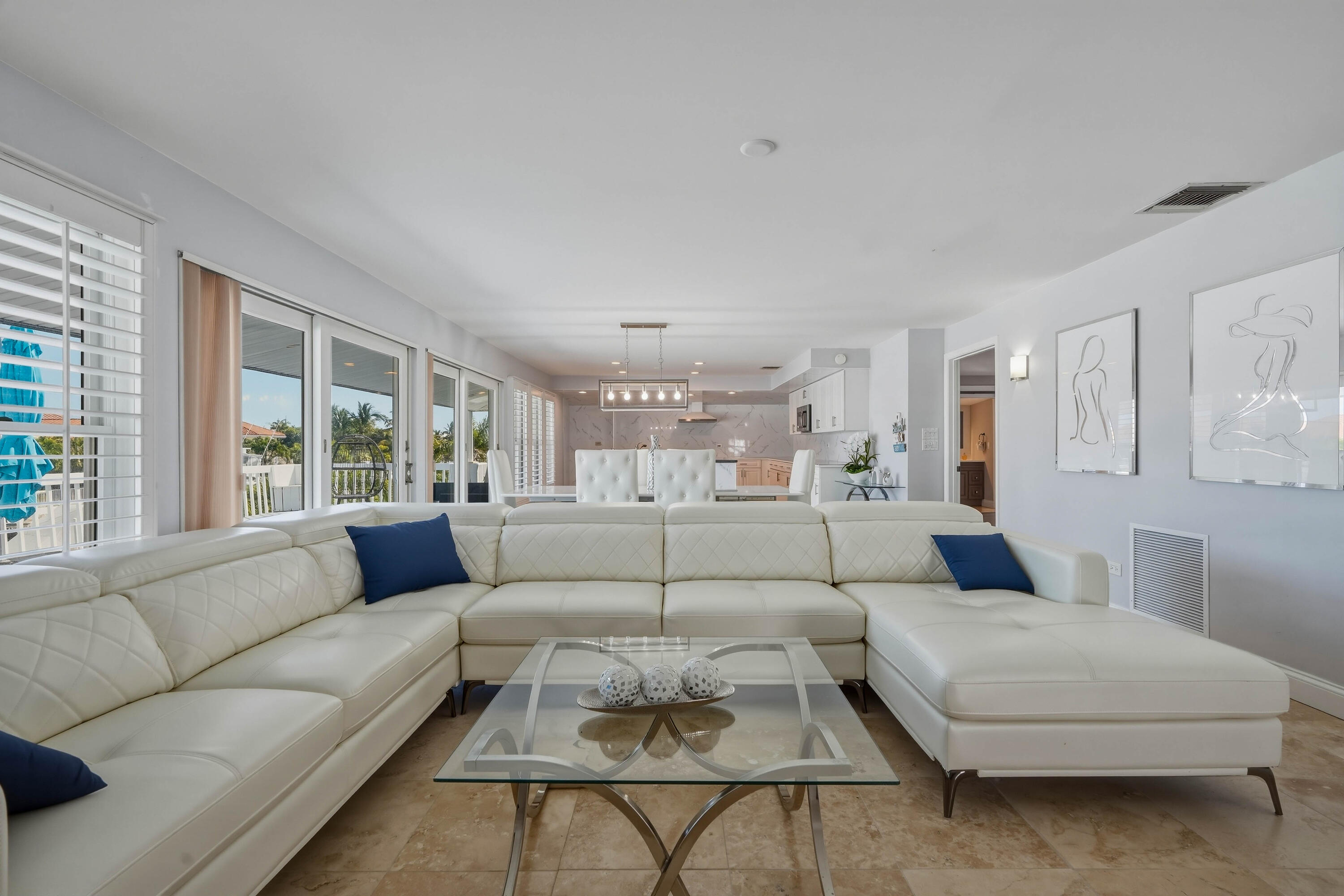 320 5th Street Key Colony Beach, FL 33051 - Photo 8 of 53 a living room with furniture and a large window