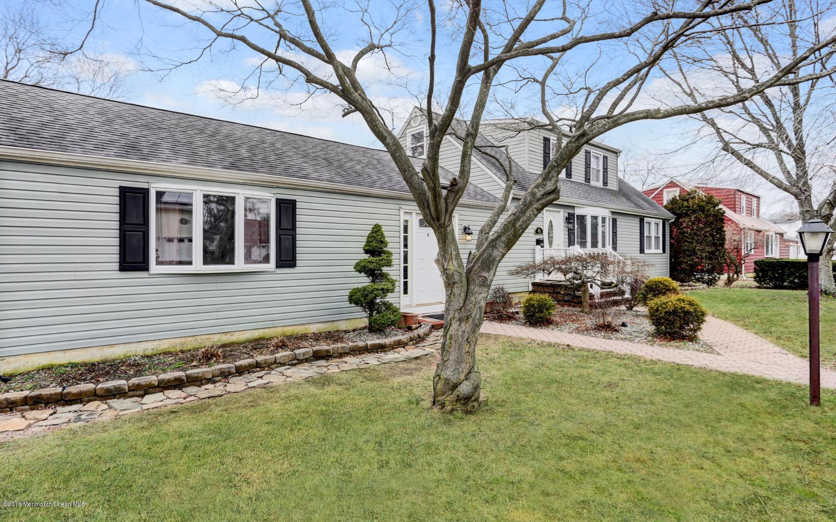 40 Drift Road Middletown, NJ 07718 - Photo 2 of 25 a view of a house with a yard covered in snow