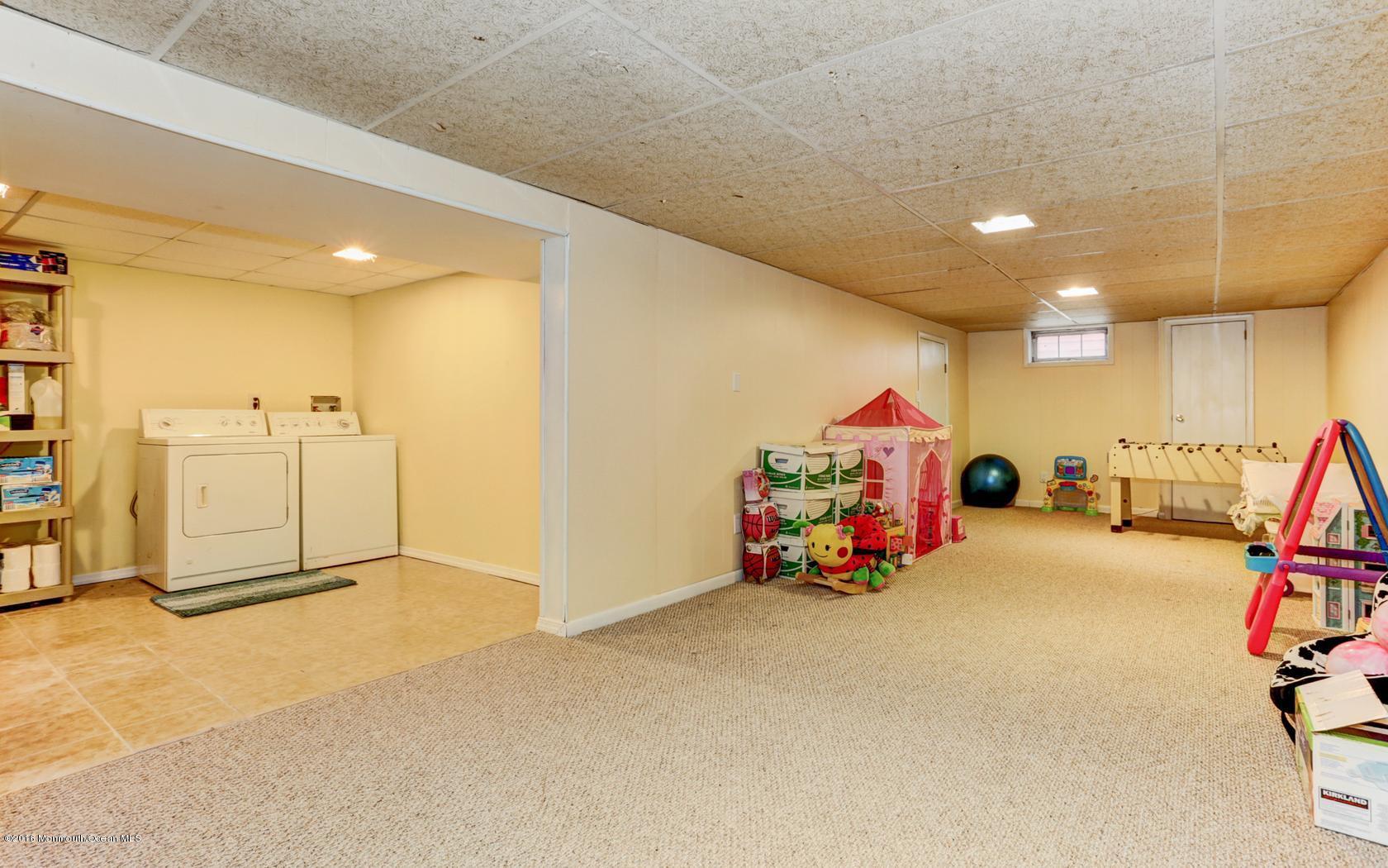 40 Drift Road Middletown, NJ 07718 - Photo 21 of 25 a view of a room with gym equipment