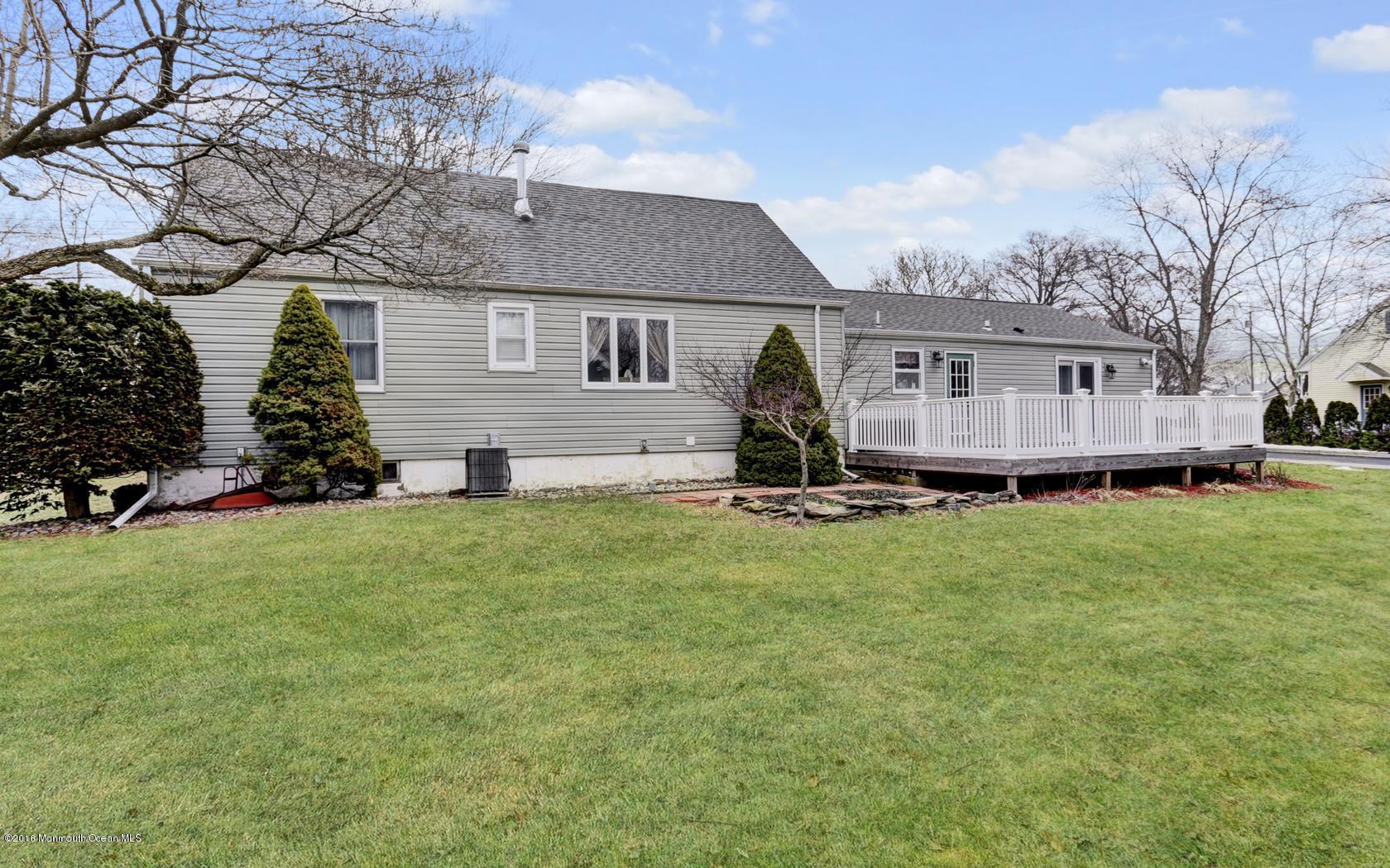 40 Drift Road Middletown, NJ 07718 - Photo 24 of 25 a front view of a house with a garden