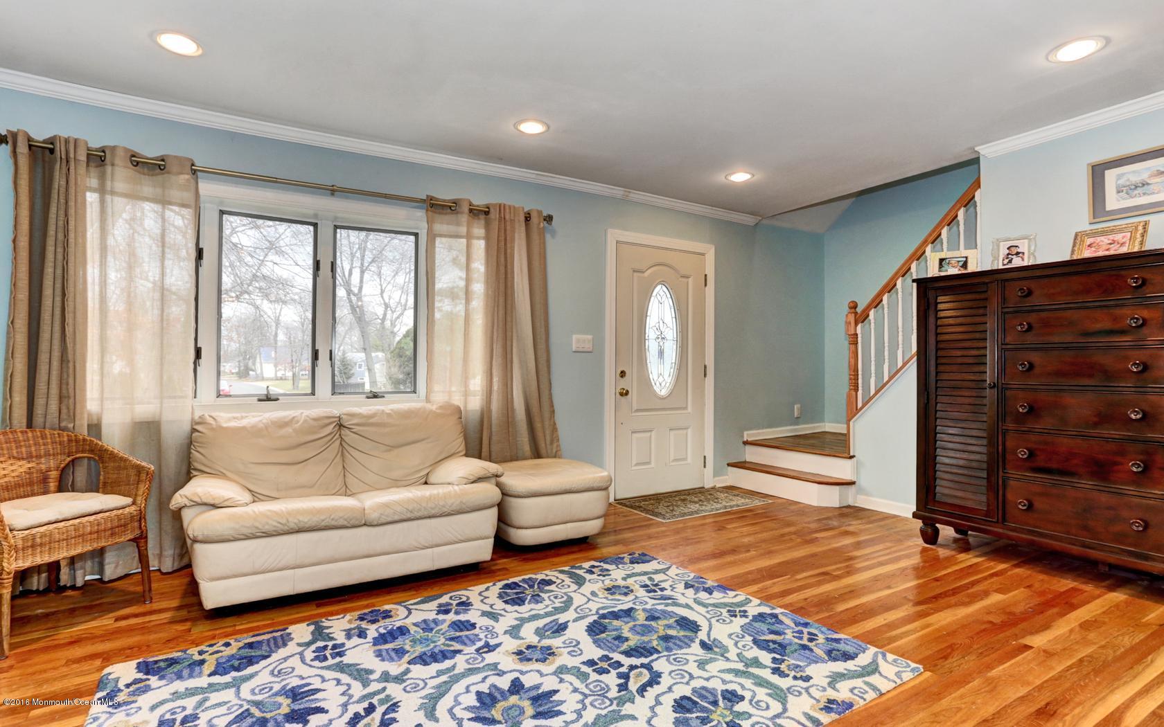 40 Drift Road Middletown, NJ 07718 - Photo 4 of 25 a living room with furniture and a rug