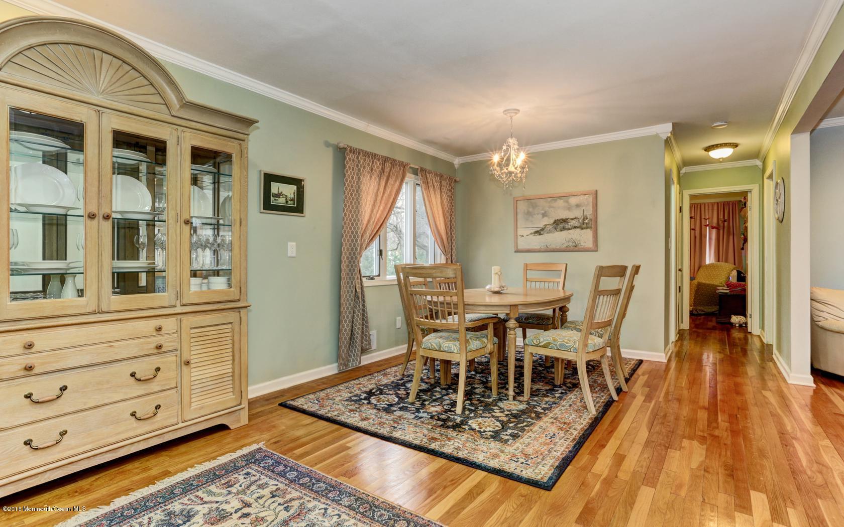 40 Drift Road Middletown, NJ 07718 - Photo 9 of 25 a dining room with wooden floor and furniture