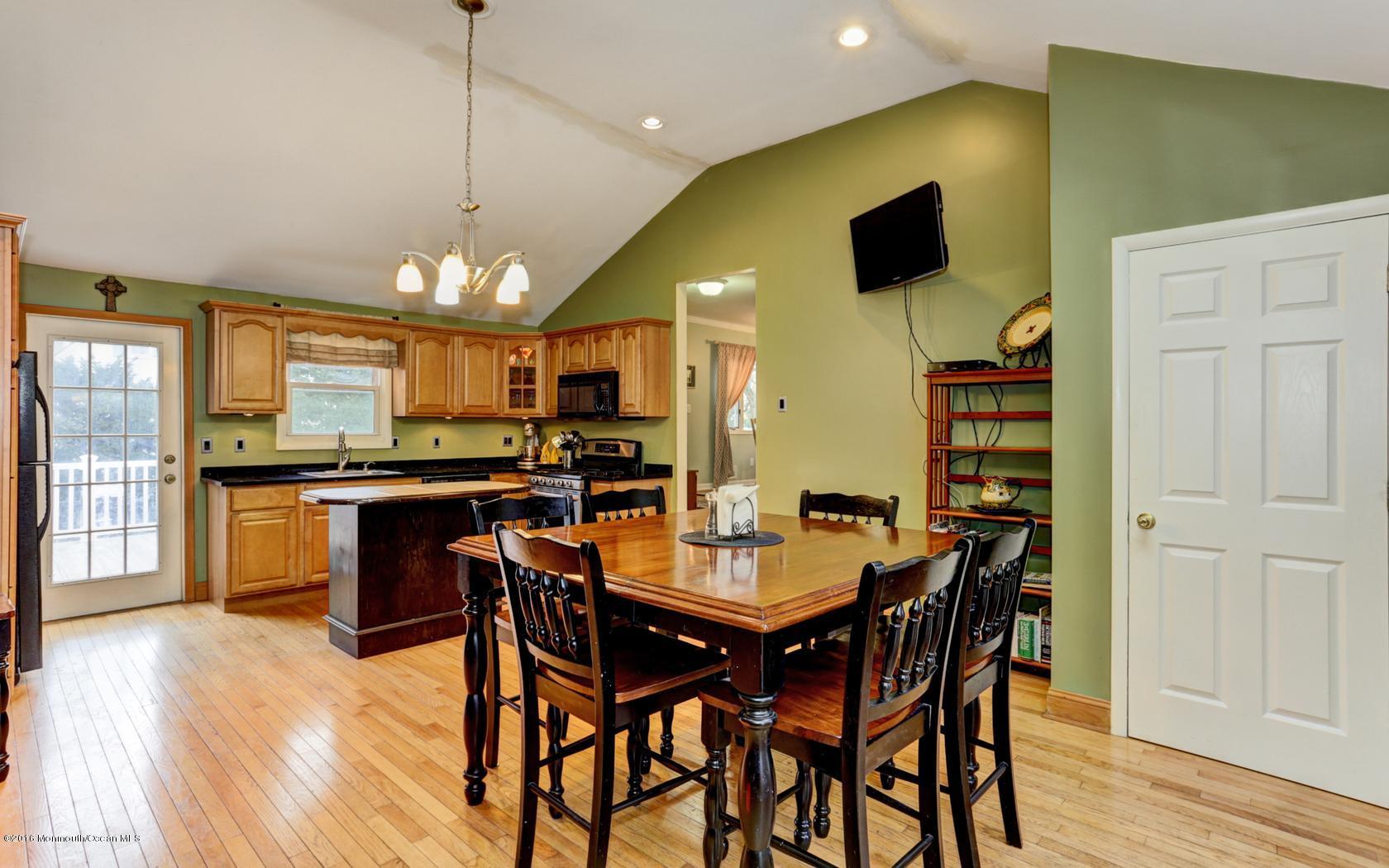 40 Drift Road Middletown, NJ 07718 - Photo 10 of 25 a kitchen with a table and chairs in it