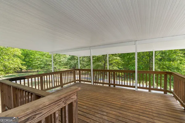a view of a patio with swimming pool