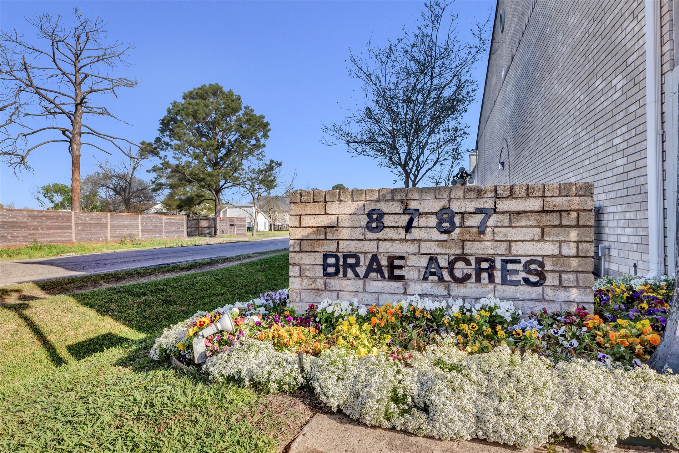 8787 Brae Acres Road, Unit 307 Houston, TX 77074 - Photo 15 of 15 a large building with swimming pool in front of it