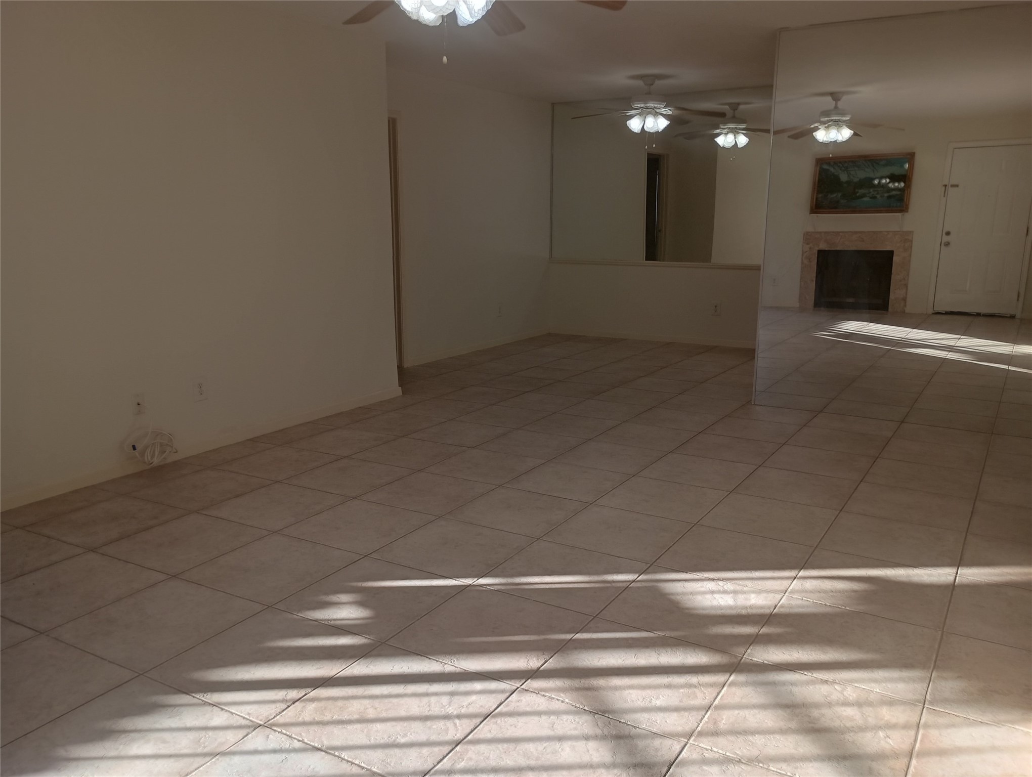 8787 Brae Acres Road, Unit 307 Houston, TX 77074 - Photo 3 of 15 a view of a hallway with an empty room