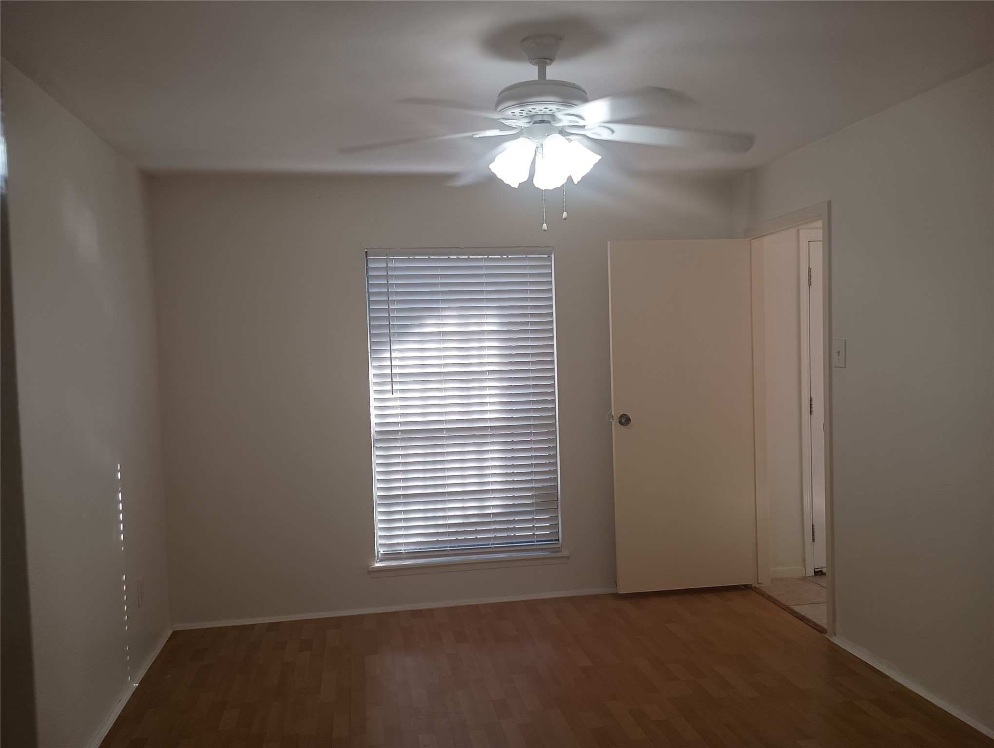 8787 Brae Acres Road, Unit 307 Houston, TX 77074 - Photo 7 of 15 a view of an empty room with a window