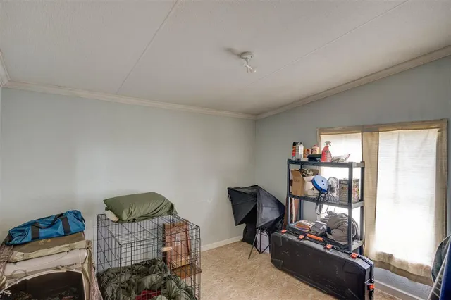a livingroom with furniture and a window