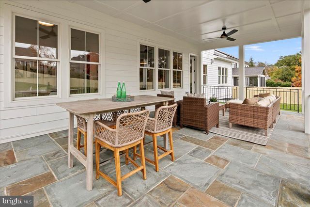 a dinning area with a table and chairs
