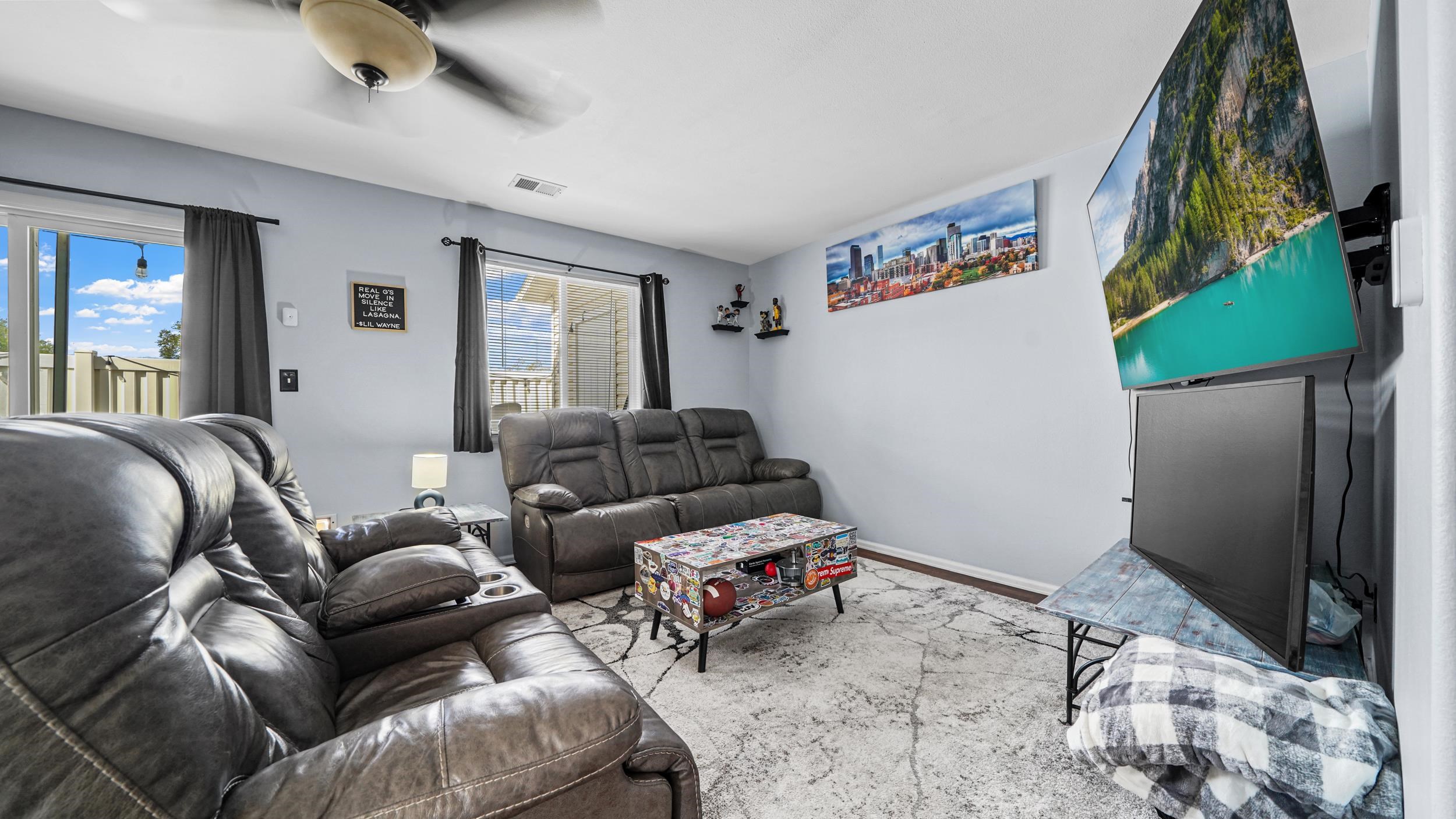 1755 Christopher Way Grand Junction, CO 81503 - Photo 11 of 30 a living room with furniture and a window