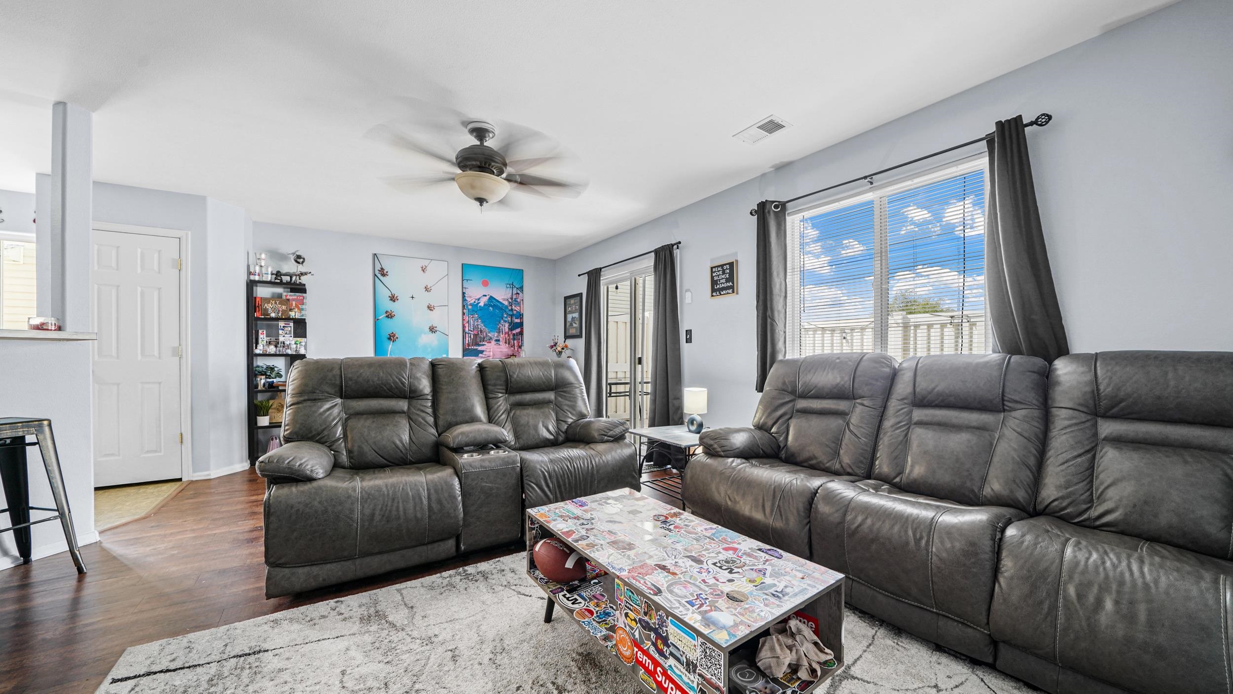1755 Christopher Way Grand Junction, CO 81503 - Photo 13 of 30 a living room with furniture and a large window