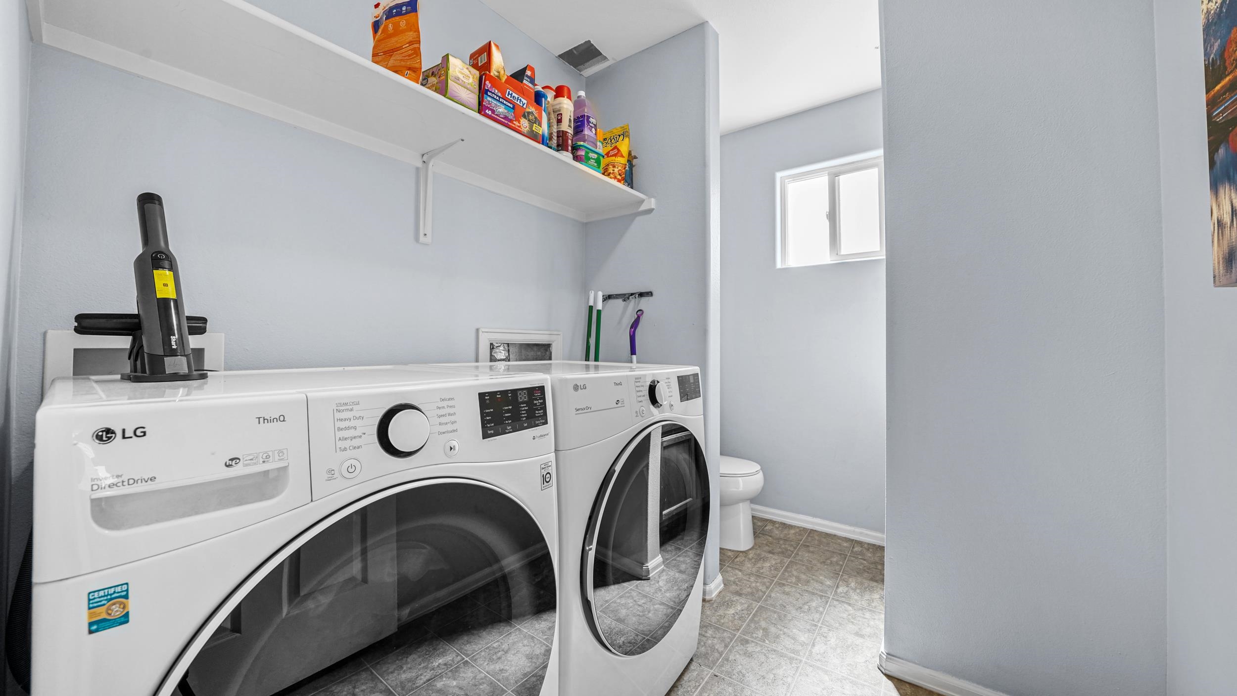 1755 Christopher Way Grand Junction, CO 81503 - Photo 14 of 30 a utility room with dryer and washer