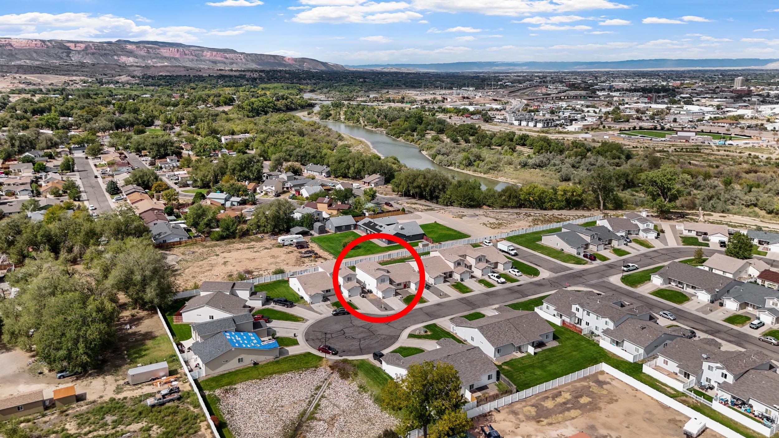 1755 Christopher Way Grand Junction, CO 81503 - Photo 27 of 30 an aerial view of a city and mountain view in back