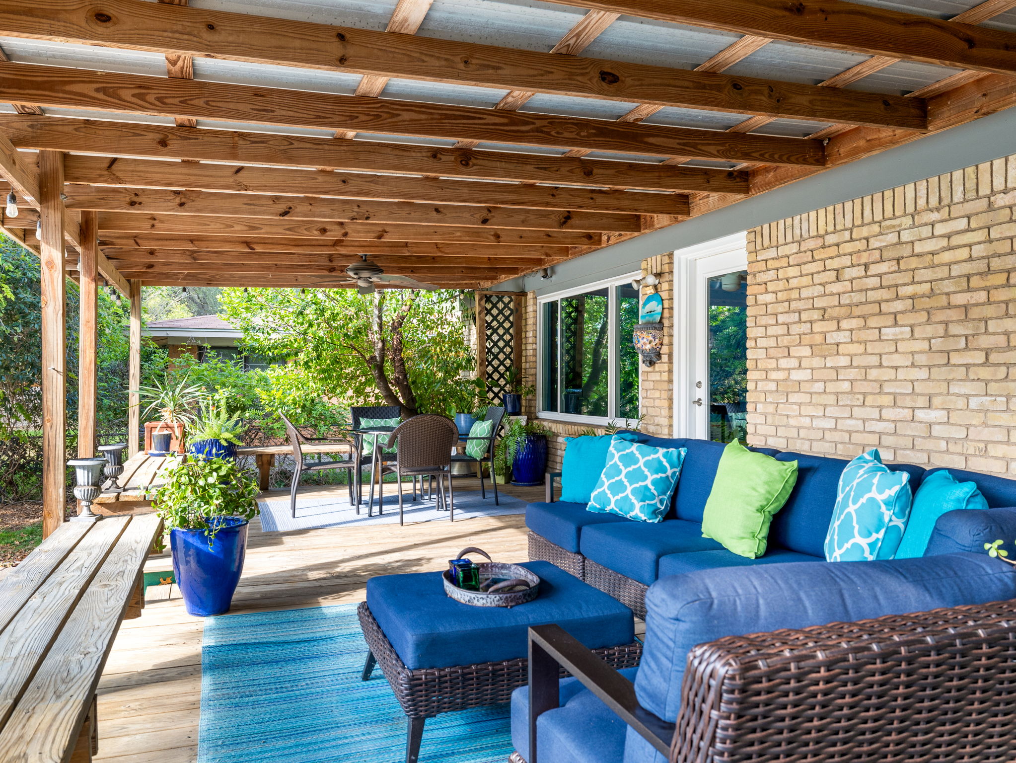 4710 Frontier Trail Austin, TX 78745 - Photo 27 of 32 a outdoor living space with furniture and a garden