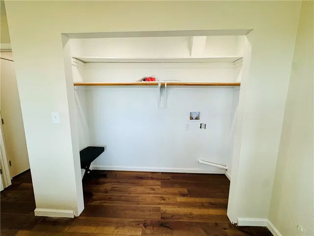 a view of small space with wooden floor