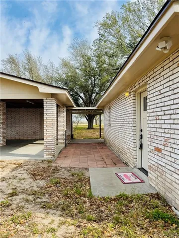 a front view of a house with yard