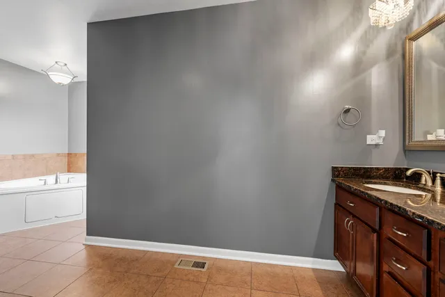 a utility room with closet dryer and washer