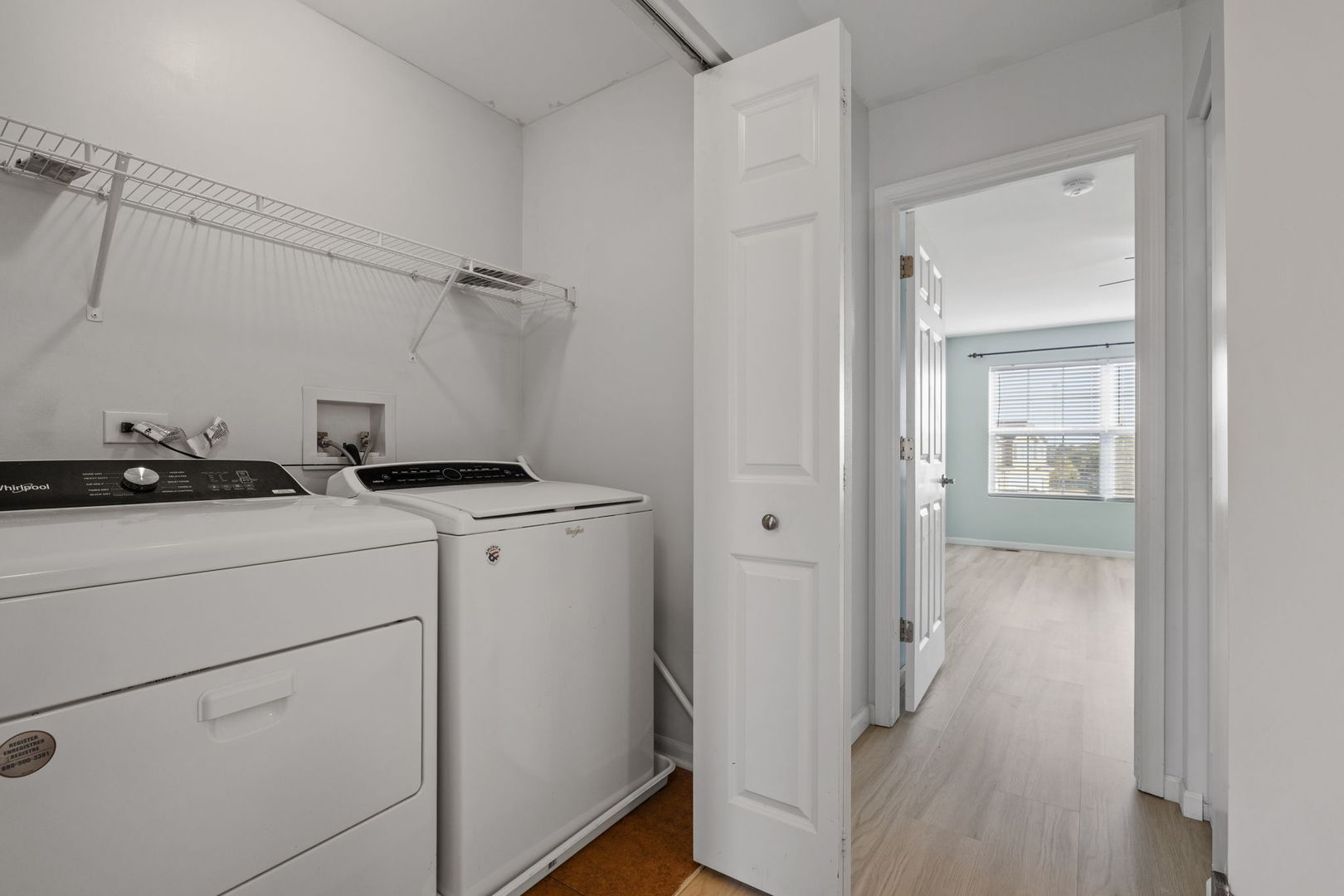 526 Lily Court Minooka, IL 60447 - Photo 21 of 26 a utility room with closet dryer and washer