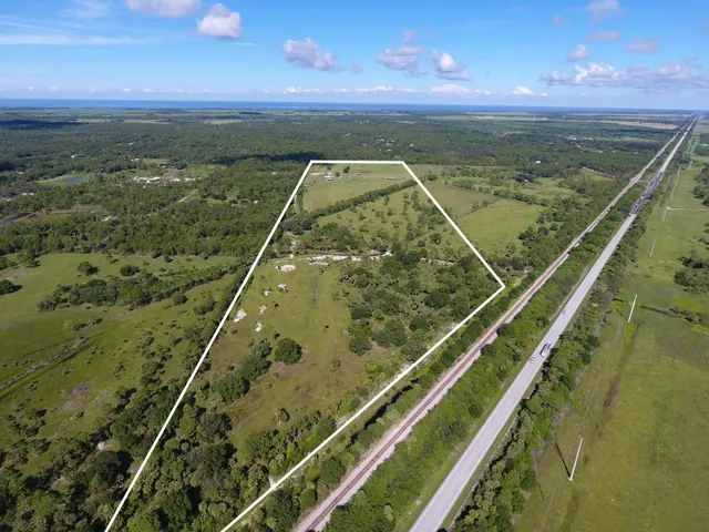 a view of swimming pool from a balcony