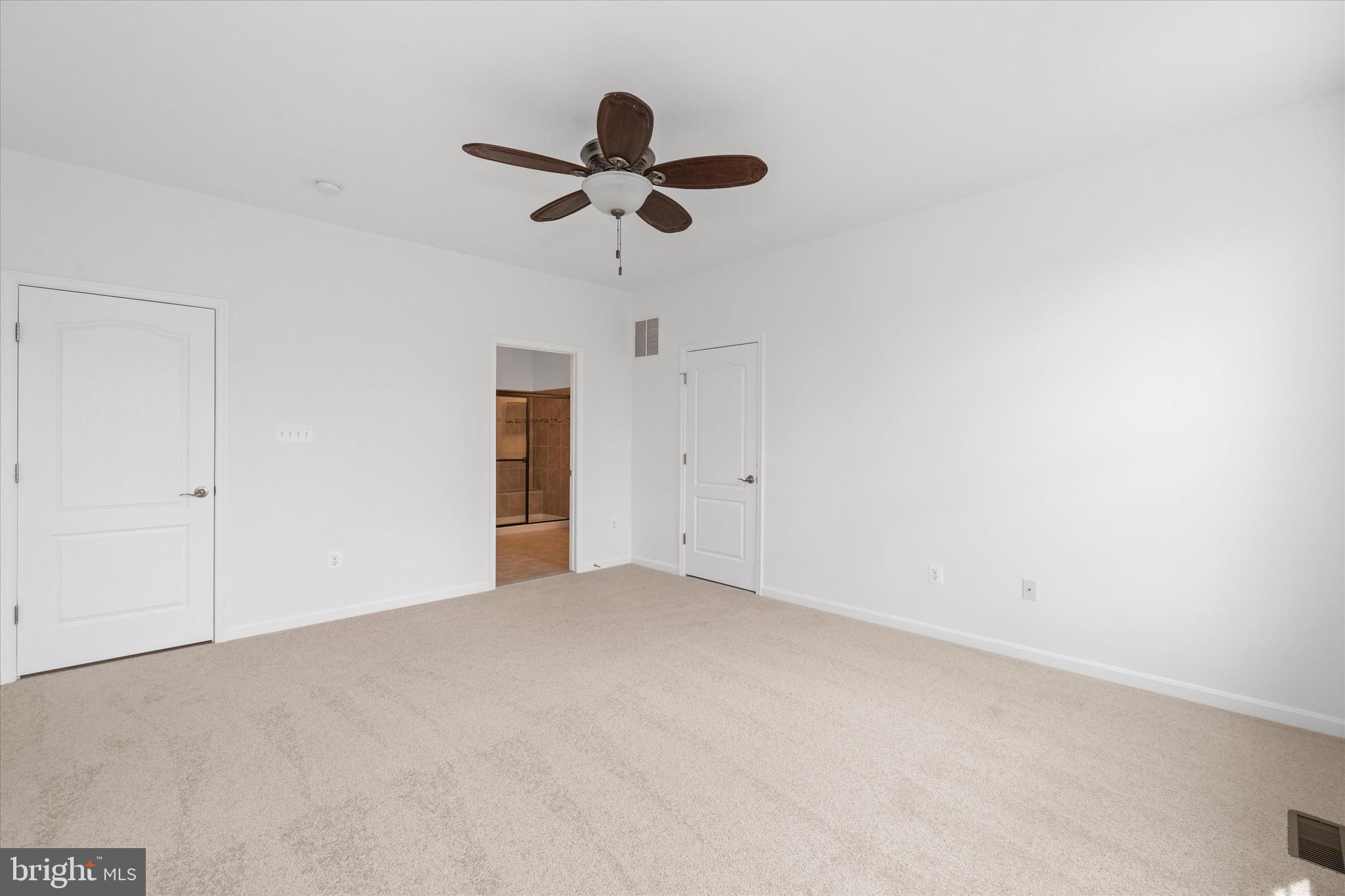 424 Winterberry Drive Middletown, DE 19709 - Photo 21 of 43 a view of a big room with wooden floor