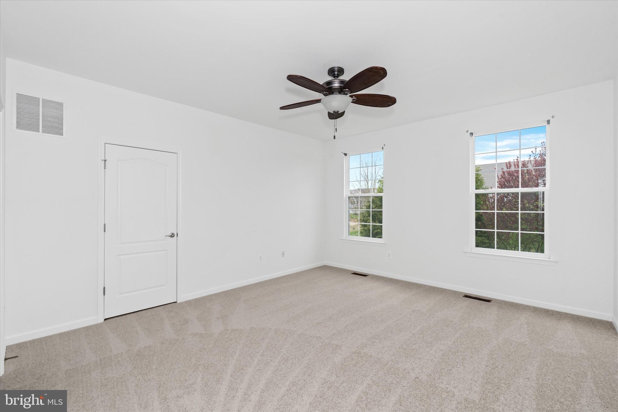 424 Winterberry Drive Middletown, DE 19709 - Photo 22 of 43 a view of an empty room with a window