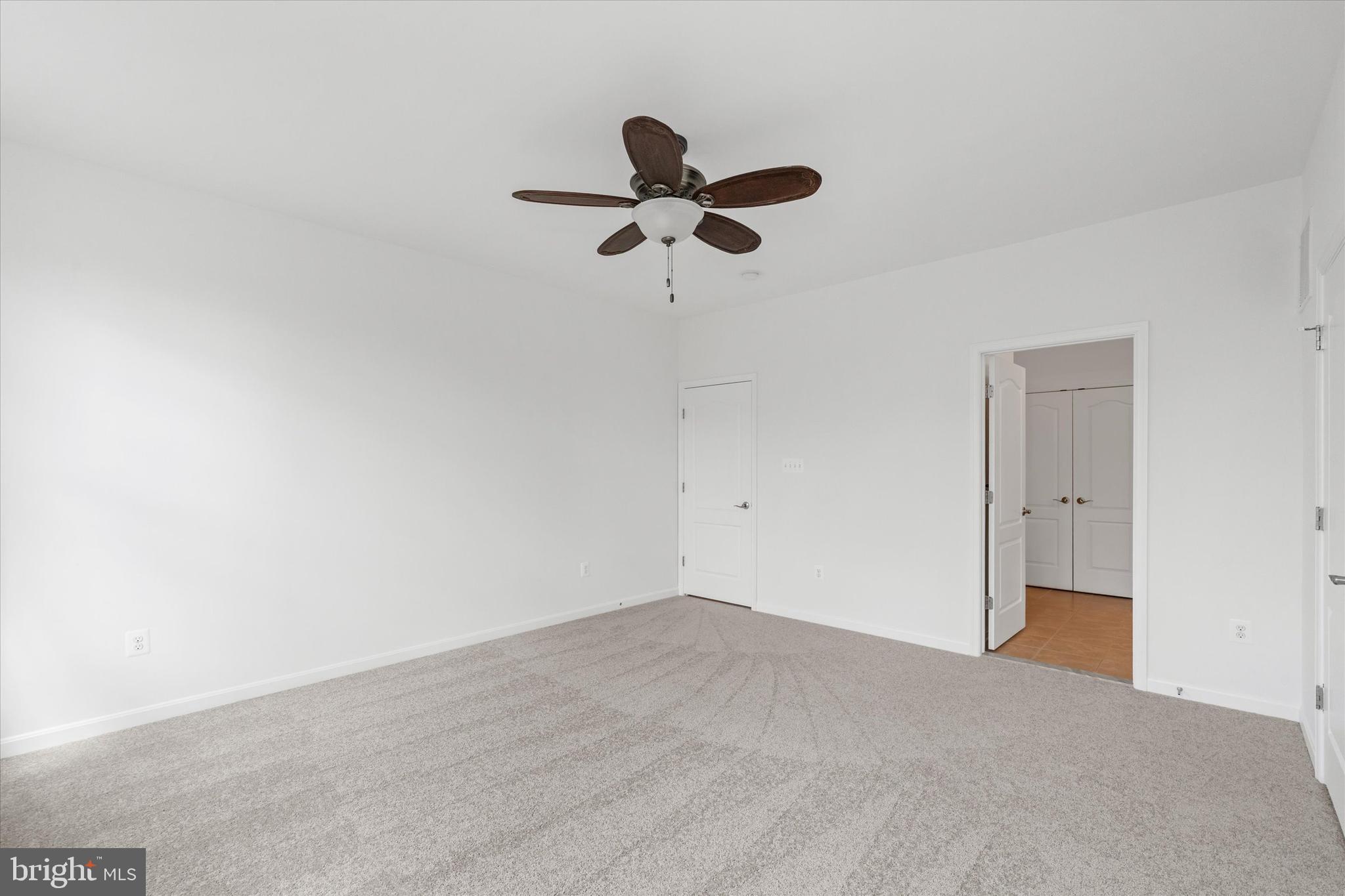 424 Winterberry Drive Middletown, DE 19709 - Photo 23 of 43 a view of a big room with carpet