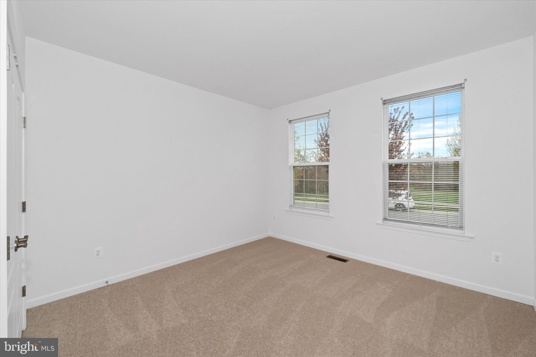 424 Winterberry Drive Middletown, DE 19709 - Photo 26 of 43 an empty room with a window