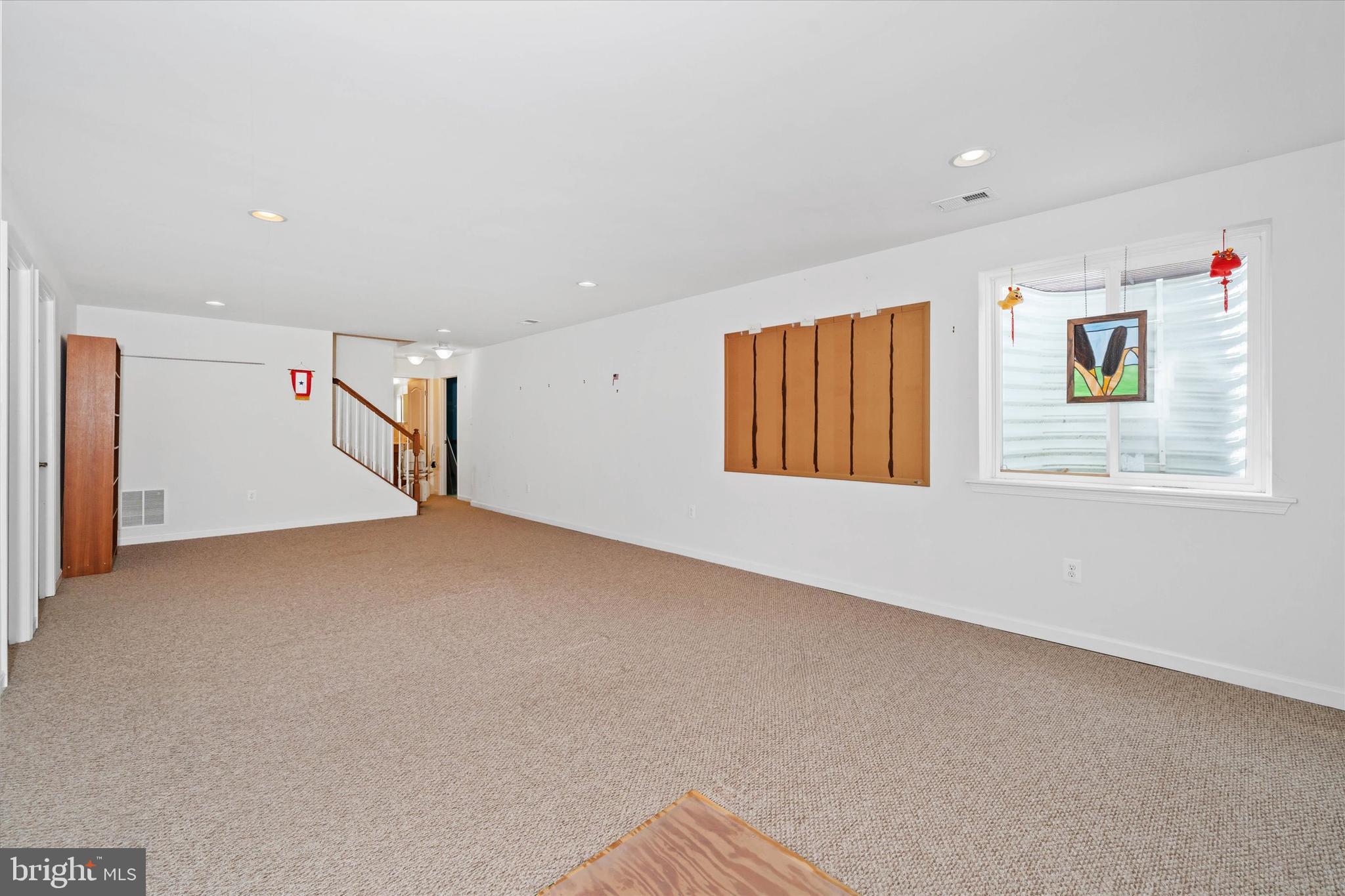 424 Winterberry Drive Middletown, DE 19709 - Photo 31 of 43 a view of an empty room with a window