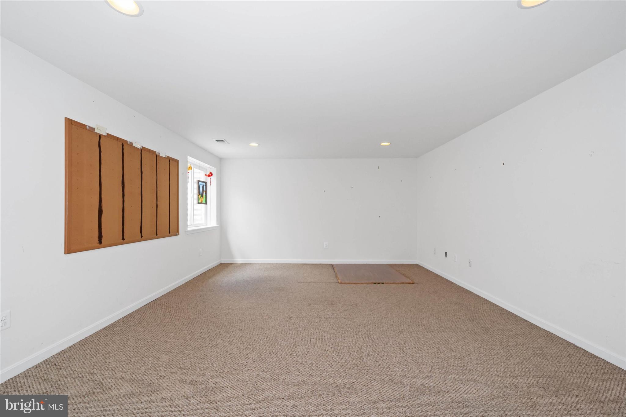 424 Winterberry Drive Middletown, DE 19709 - Photo 32 of 43 an empty room with window