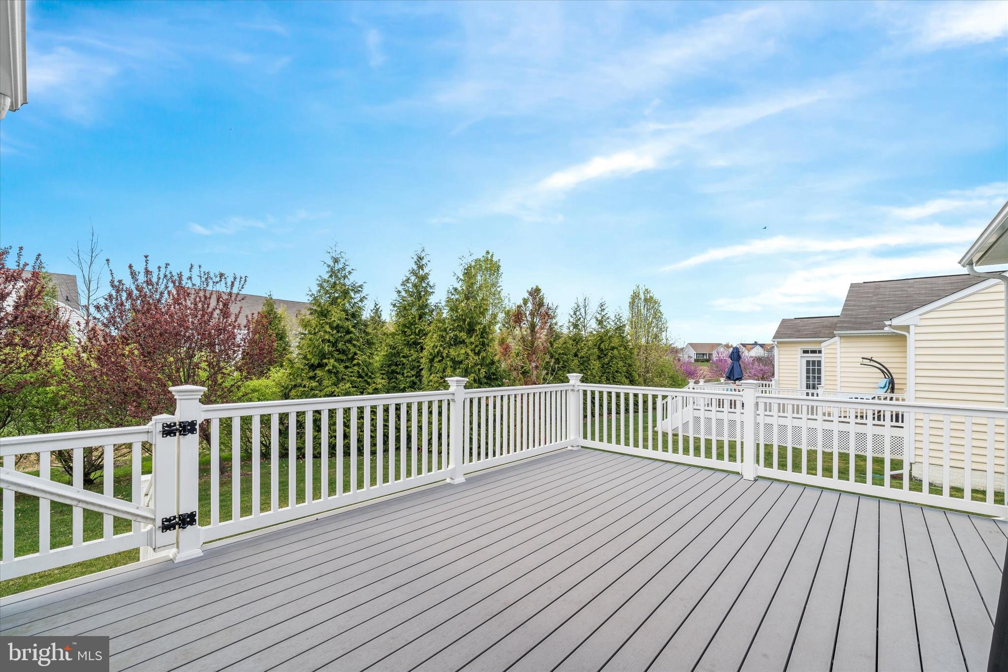 424 Winterberry Drive Middletown, DE 19709 - Photo 40 of 43 a view of a roof with wooden floor and fence