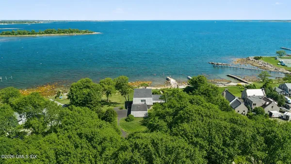 a view of a lake with a big yard