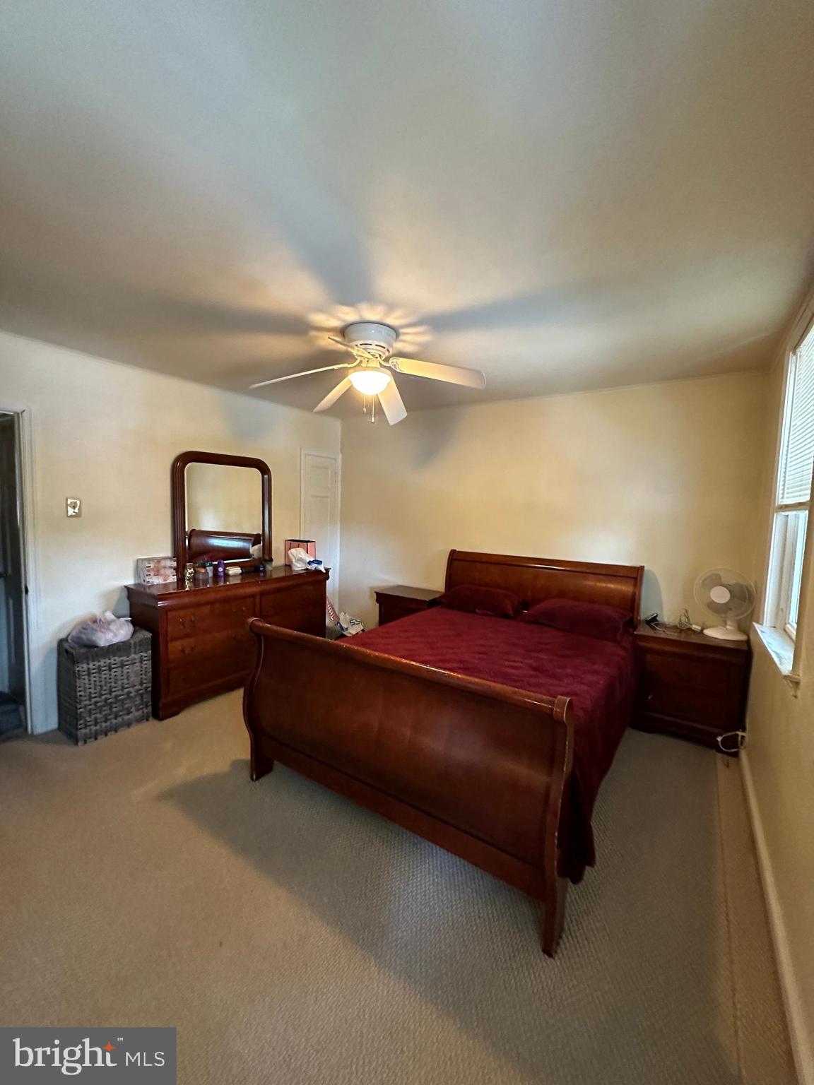6018 Frontenac Street Philadelphia, PA 19149 - Photo 24 of 30 a living room with furniture and a chandelier