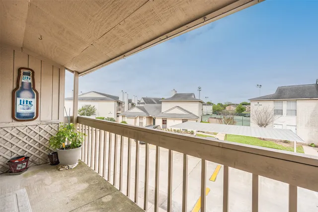 a view of a porch and living room