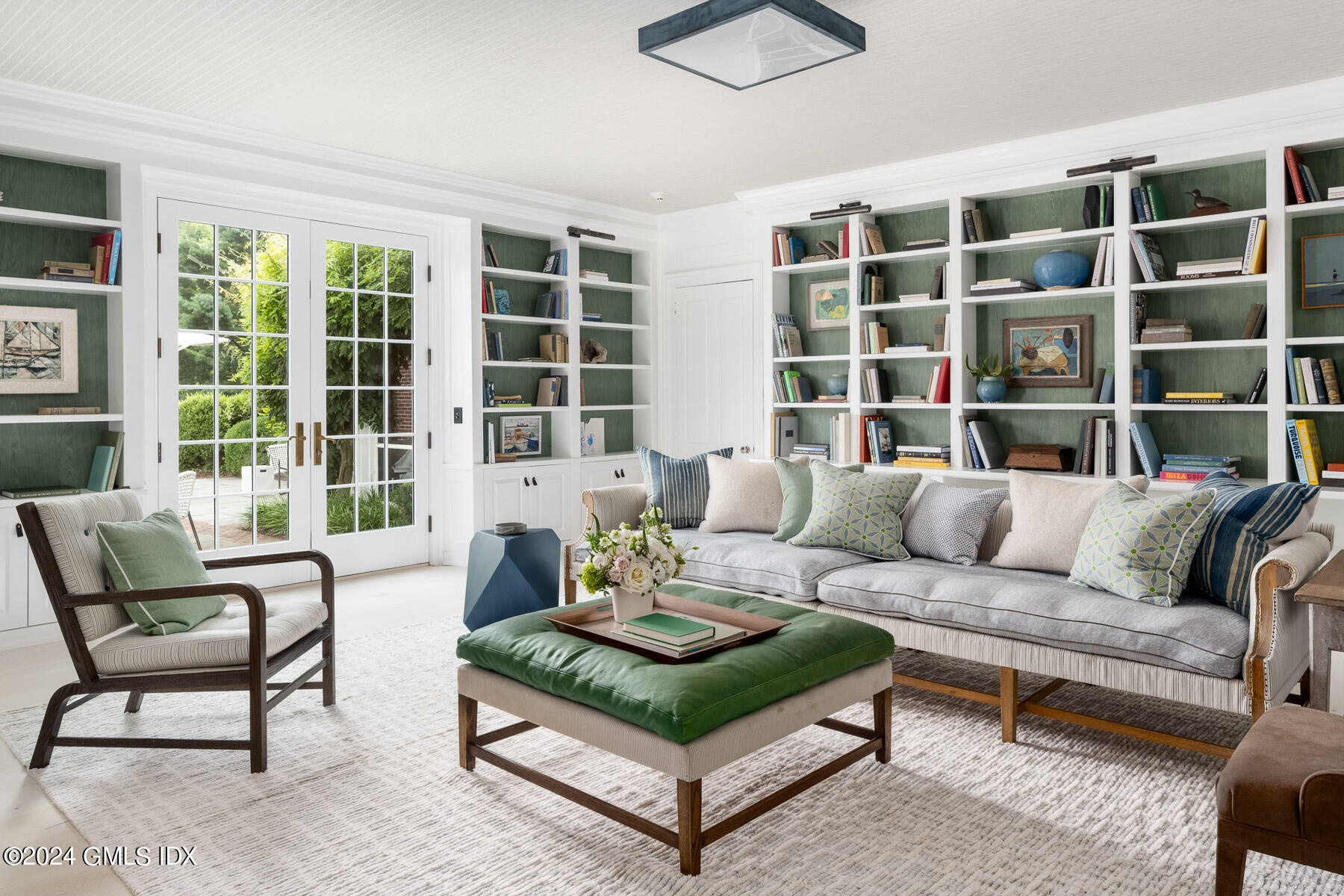 313 Stanwich Road Greenwich, CT 06830 - Photo 13 of 42 a living room with furniture and a large window