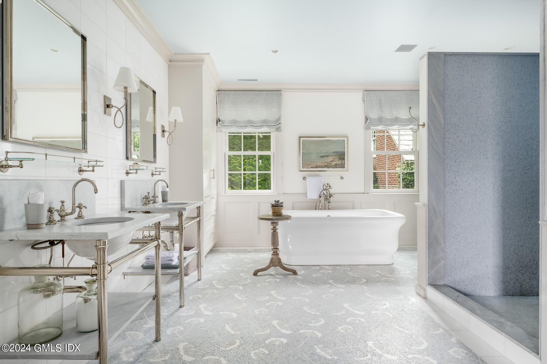 313 Stanwich Road Greenwich, CT 06830 - Photo 19 of 42 a living room with furniture a large window and wooden floor