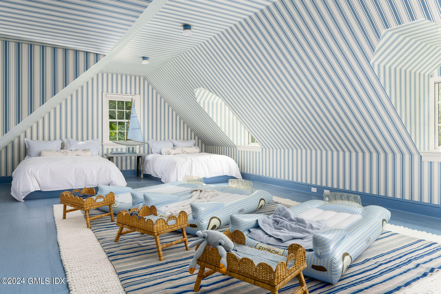 313 Stanwich Road Greenwich, CT 06830 - Photo 24 of 42 a living room with furniture and a large window